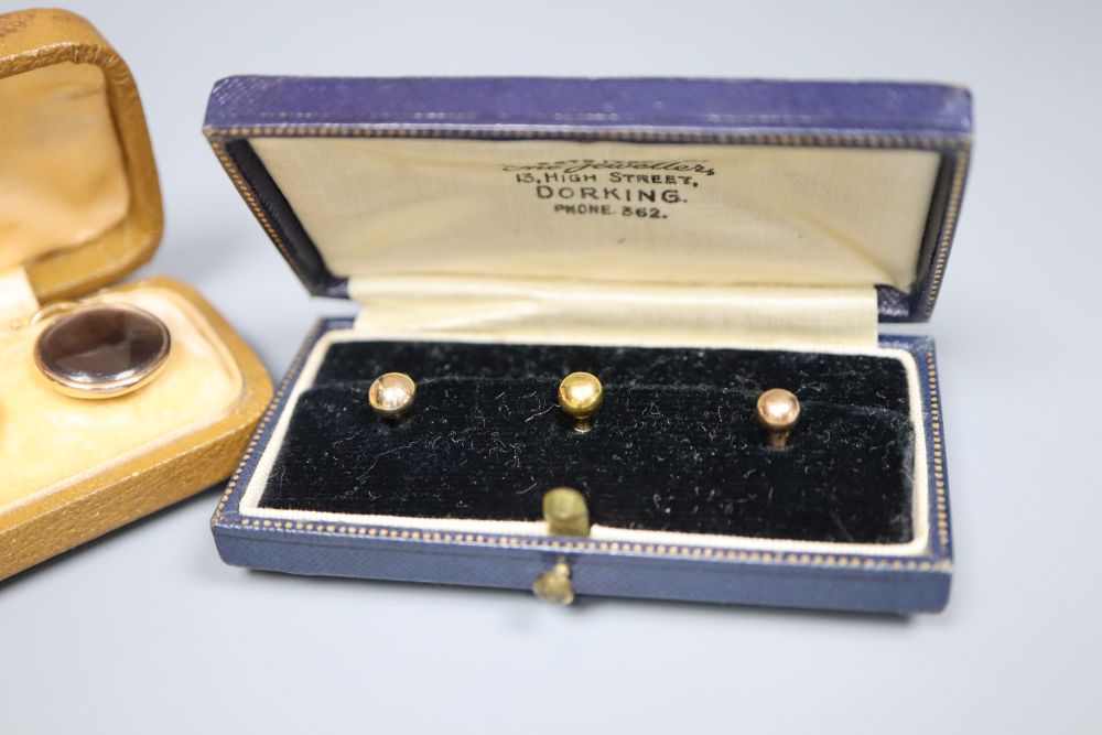 Six 9ct dress studs in two cases and one other cased set of six dress studs,